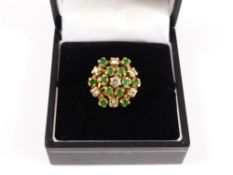 A Lady`s 18 ct hallmark Emerald and Diamond Cluster Ring, size N, approx 7 gm.
