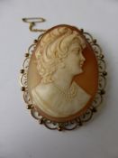 A Shell Cameo Brooch set in Ornate 9 ct gold mount with safety chain, 5.5 x 4.5 mm.