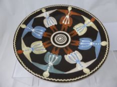A Hand Painted Studio Pottery Dish, with foliate design within concentric circles, nr 4/30