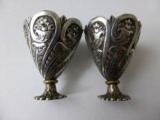 A Pair of Antique Solid Silver Turkish Zarss. The cups having ornate floral and feather decoration