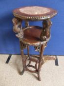 A Chinese Rosewood Plant Stand, decorative carving to the leg mounts with a integral shelf and a