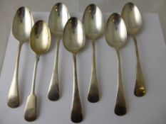 Six Solid Silver Birmingham Hallmark Tablespoons, dated 1931 together with a single Nevada silver