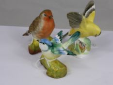 Two Crown Staffordshire models of birds, designed and modelled by JT. Jones, comprising a Robin 9