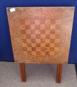 An Edwardian X Frame Chequer Board Folding Games Table, approx 55 x 57 cms.