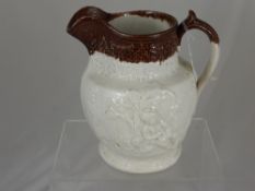 Victorian Cream Glazed Pottery Ale Jug depicting character resting beneath a chair 27 cms. high.