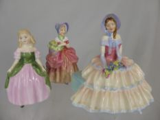 Three Porcelain Royal Doulton Figures, including `Day Dreams HN 1731?, `Penny` HN 2338 and ?Cissy?