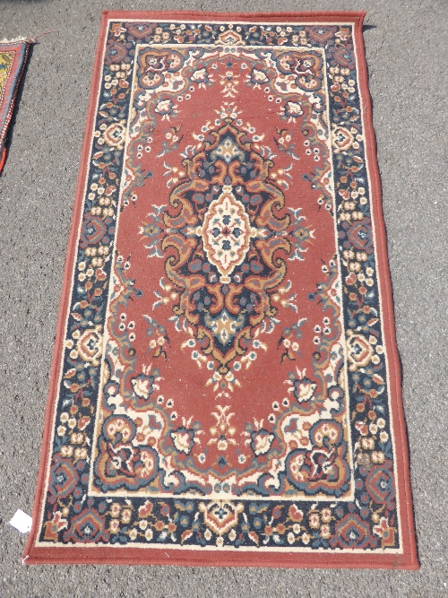Middle Eastern Style Woollen Rug, with pink border, approx 150 x 80 cms