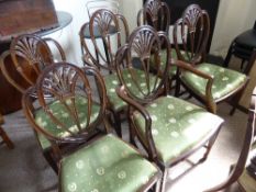 Set of six Hepplewhite style shield and feather back dining chairs having tapered legs and spade