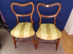 Pair of Victorian oak bedroom chairs, the seats being covered in gold patterned material.