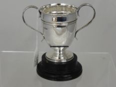 A Solid Silver Presentation Cup, Sheffield hallmark, dated 1920, unmarked, approximately 220 gms.