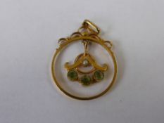 Lady`s Yellow Gold Peridot and Seed Pearl Drop Pendant, approx 1.8 gms