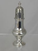 A Solid Silver Castor, London Hallmark, dated 1929, approx 220 gms, 21 cms.