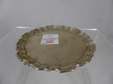 Solid Silver Card Tray, London hallmark, dated 1903/4 m.m T.B, the tray supported on scroll feet,