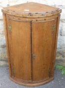 An Antique Oak Corner Cabinet, 54 x 85 x 36 cms.