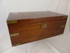 An Antique Mahogany Writing Box, the interior fitted with a black leather writing slope, two cut