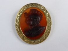 Lady`s gold and Cornelian oval pin brooch  the fine hand carved stone using natural colours to