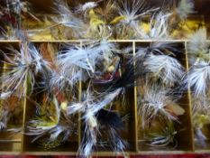 A large quantity of vintage freshwater fly fishing flies and seawater lures including prawn flies,