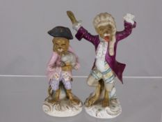 Two continental porcelain figures of monkeys, one with arms outstretched, the other holding