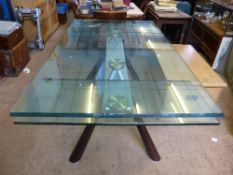 Italian Contempory plate glass topped dining table, approx. length when fully extended 260 cms.