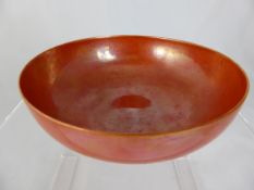 Ruskin orange lustre bowl, impressed marks to the base, approx. 14 cms. diameter ( W A F )