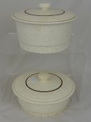 Collection of Cream Poole Pottery, comprising two lidded tureens,  a lidded casserole dish, sugar