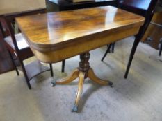 Victorian rosewood folding card table, inset with green baize, the table having a turned centre