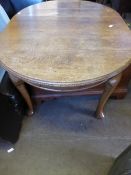 Edwardian oak oval extending dining table on cabriole style legs, approx. 185 x 106 x 67 cms.