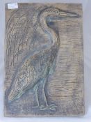 Composite stone garden wall plaque depicting a heron, approx. 44 x 30 cms.