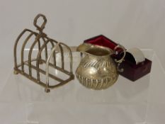 A Solid Silver Birmingham Hallmark Creamer, 1892 together with Chester hallmark napkin ring in