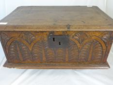 An 18th Century Bible Box, carved with foliate design to front with the original key plate,