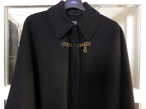 A Vintage House of Van Heems, London SW1 Clerical Cloak, a heavy wool with a lion mask clasp and