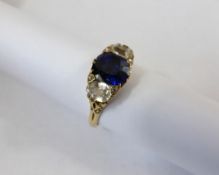 A lady`s 18ct Yellow Gold, White Stone and Sapphire Ring, 8 x 7mm 1.4 to 1.9 cts, approx 5.7 gms