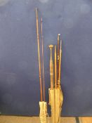 A miscellaneous collection of Fishing Equipment including a cane three piece salmon rod and salmon
