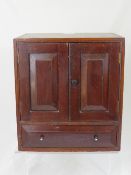 A Small Antique Oak Chest, possibly an apprentice piece, with two cupboards and a single drawer