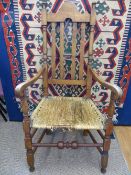 An 18th Century New England Grandfather Chair, with a coarse rush seat