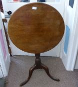 Antique Mahogany Tilt-Top Wine Table on a turned column supported on a tripod base with cabriole