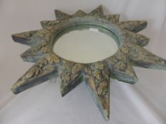 Composite stone patio mirror in the form of a star etched with vines, approx. 60 cms.