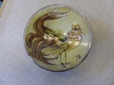 A Chelsea pottery dish depicting cockerel, signed to back, approx. 14 cms.