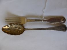 A Solid Silver London Hallmark Berry Spoon dated 1786 maker`s mark C.B. together with a London