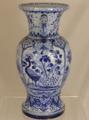 19th Century Blue and White Delft Vase, the vase having segmented panels depicting typical Dutch