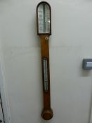 Antique stick barometer by Leech, Chelmsford, the barometer set in a burr maple case, approx.