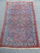 Middle Eastern Style Rug, foliate design on blue ground, approx  170 x 105 cms