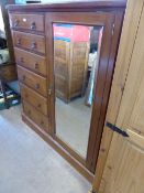Victorian Gent`s mahogany Compactum having a bevelled glass mirrored door to the right hand side