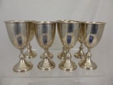 Eight Solid Silver Chalices, London Hallmark, dated 1962, all goblets with gilded interior, approx