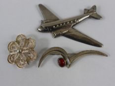 Solid Silver 925 Brooch in the form of an Aeroplane, together with a filigree flower and a Art Deco