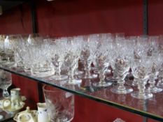 Collection of Royal Doulton cut crystal glasses comprising eight brandy balloons, eight red wine,