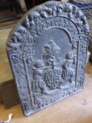 Vintage cast iron fire back depicting a grape harvest scene, approx. 59 x 84 cms.