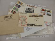 A large collection of stamps in stock books, albums and packets, most commonplace but with some