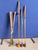 Quantity of antique golf clubs including C. Jacobs Auchterlan wood, seven vintage putters.