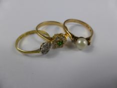 Miscellaneous Lady`s Rings, including a 750 hallmark yellow metal white and green stone ring, size